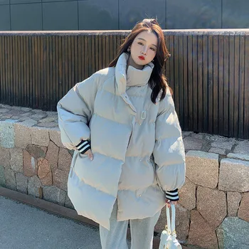 Női téli pamut párnázott dzsekik 2023 Új koreai verzió Laza állvány gallér Parka Girl Student Casual vastag kenyérruházat
